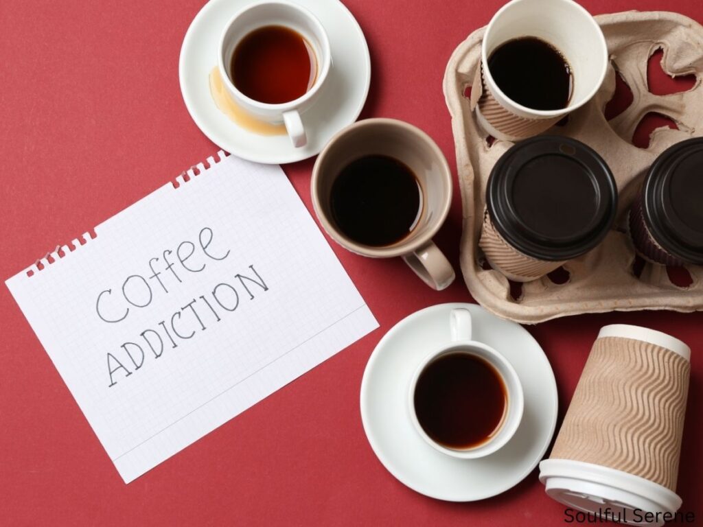 a notepad with the words coffee addiction, and cups half full of coffee.