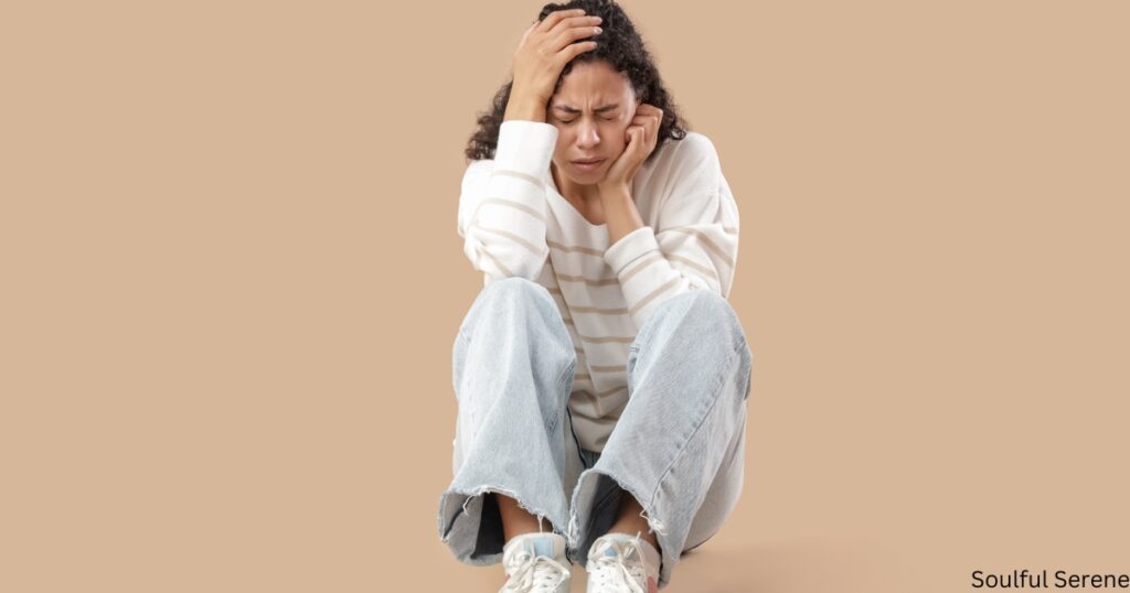 What is the Christian View of mental Illness? an African American girl having a panic attack on beige background.